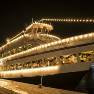 Argosey Christmas Ships stop at Seattle beaches with bonfires.