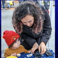 Hands on Hanukkah at the farmers market (Photo courtesy: SJCC).