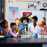 happy-diverse-female-teacher-and-school-children-d-2023-11-27-05-13-18-utc(1)