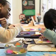• Children and adults creating art together during a hands-on program at the Northwest African American Museum in Seattle